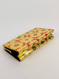 1960s Gold Embossed Leather Clutch