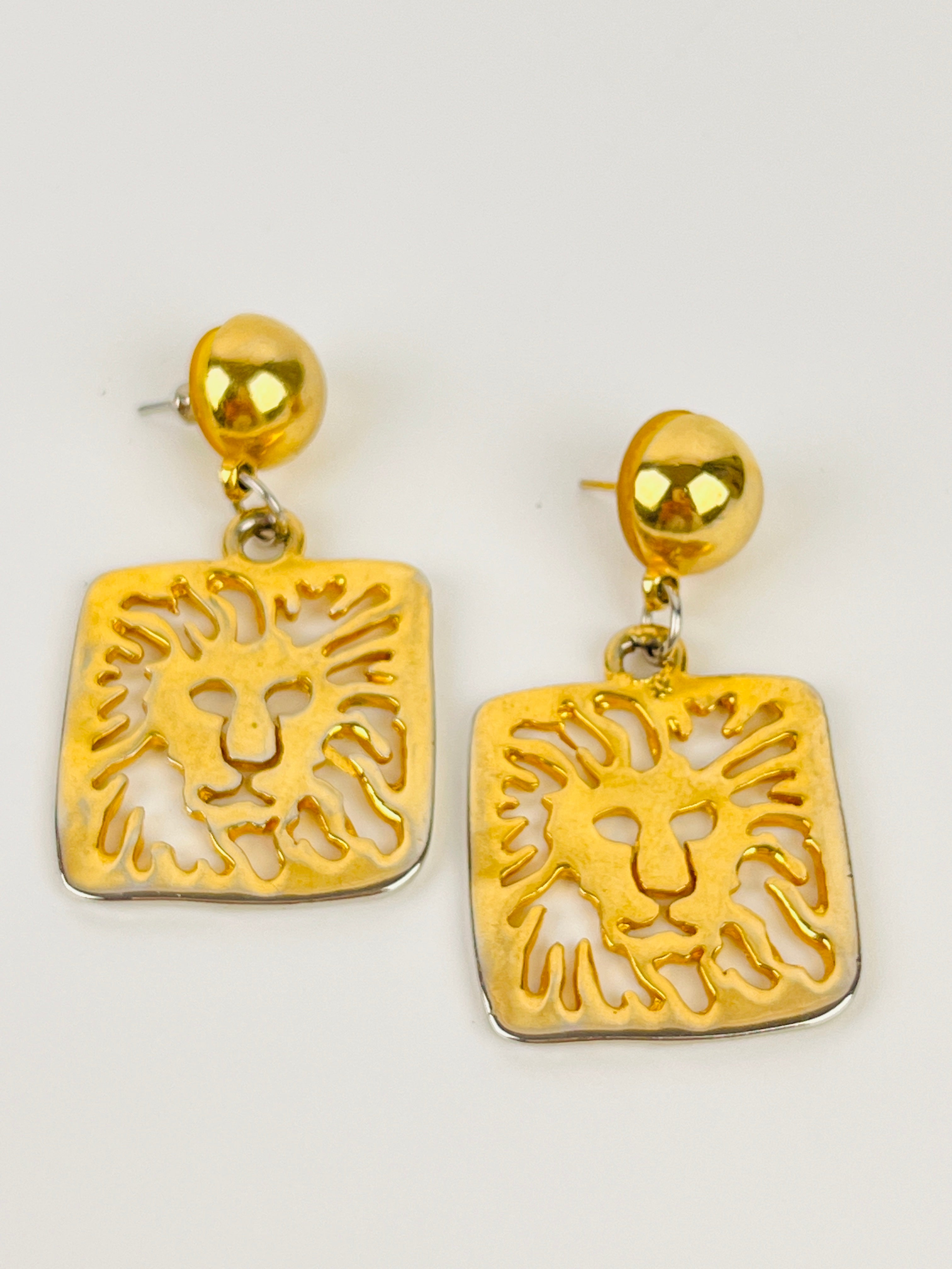 Anne Klein Vintage Cut Out deals Gold Plated Lion Head 3 Tier Drop Pierced Earrings.