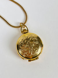 Vintage Engraved Four-Picture Locket