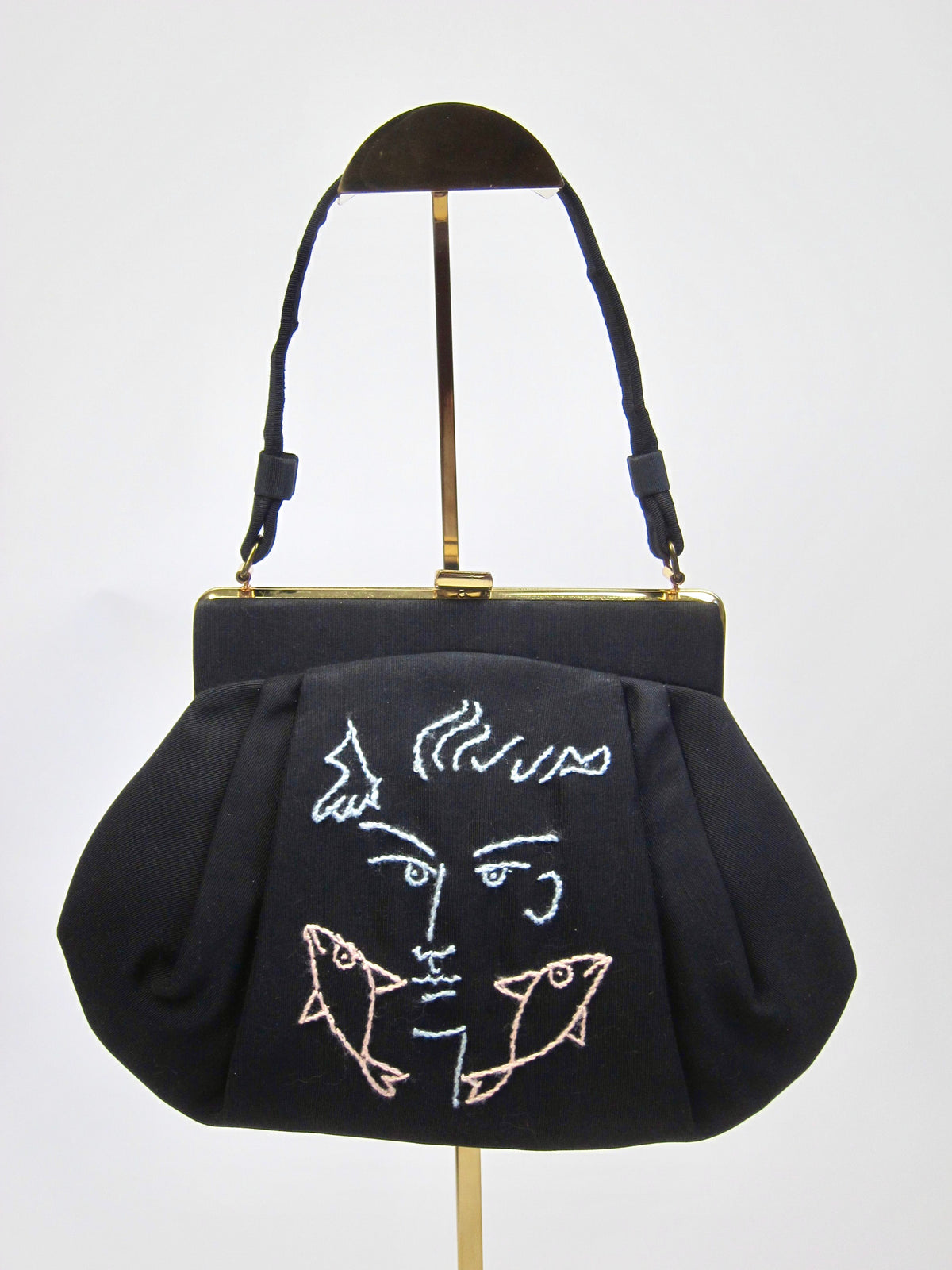The Poisson Visage Bag