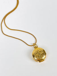 Vintage Engraved Four-Picture Locket