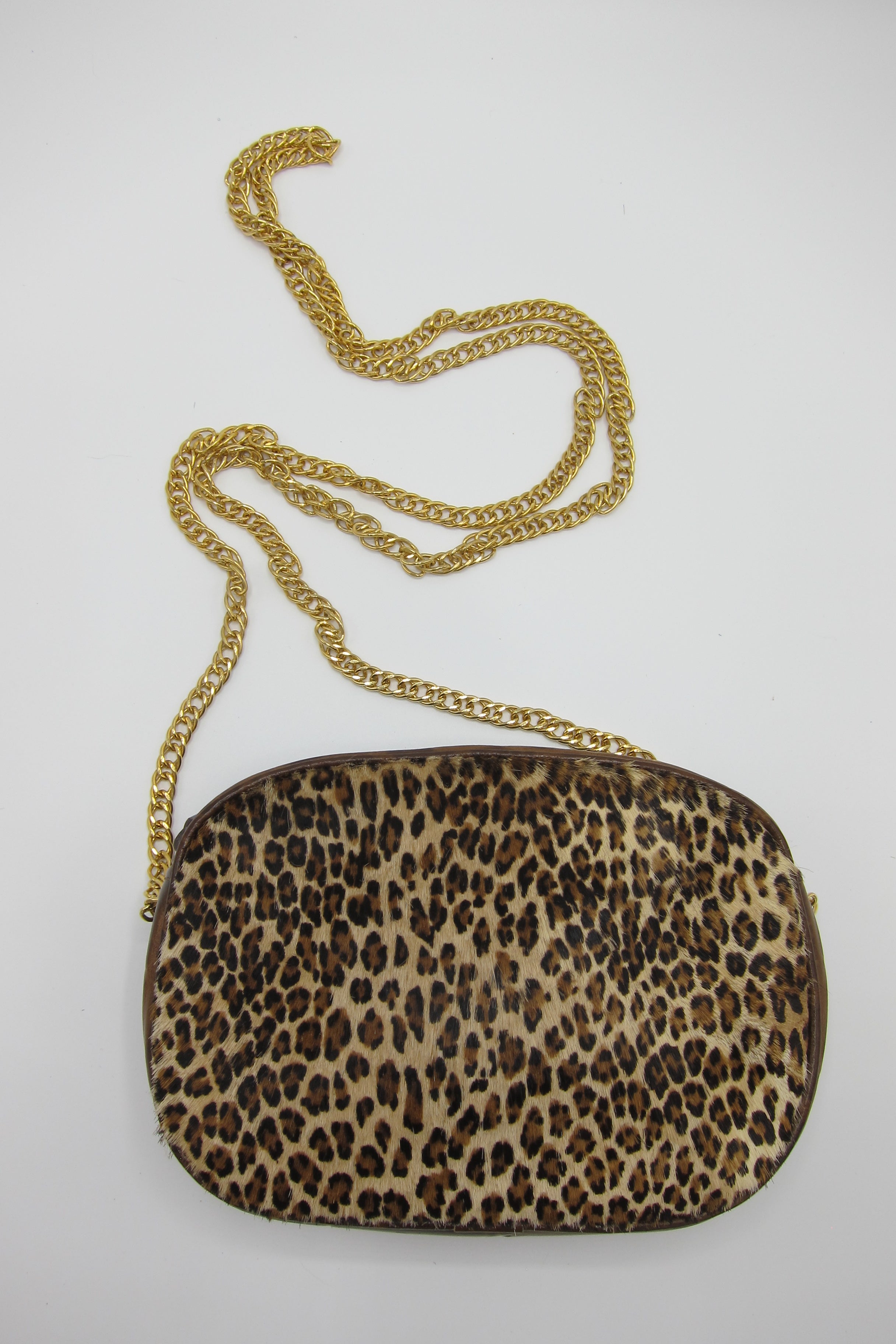 Animal-print leather purse - Women | MANGO OUTLET USA