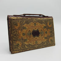 vintage gold florentine cordovan purse clutch