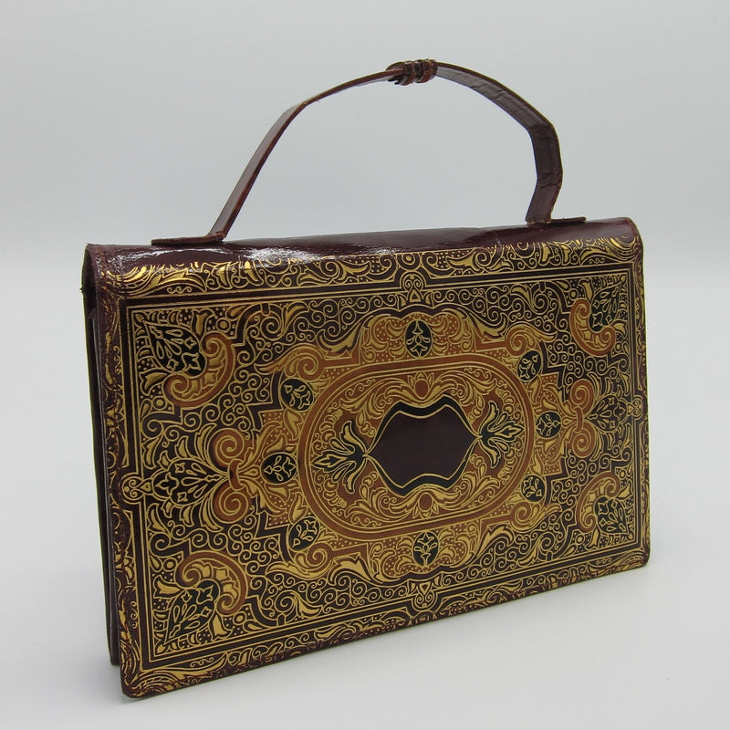 vintage gold florentine cordovan purse clutch